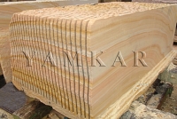 Cutting sandstone blocks into slabs